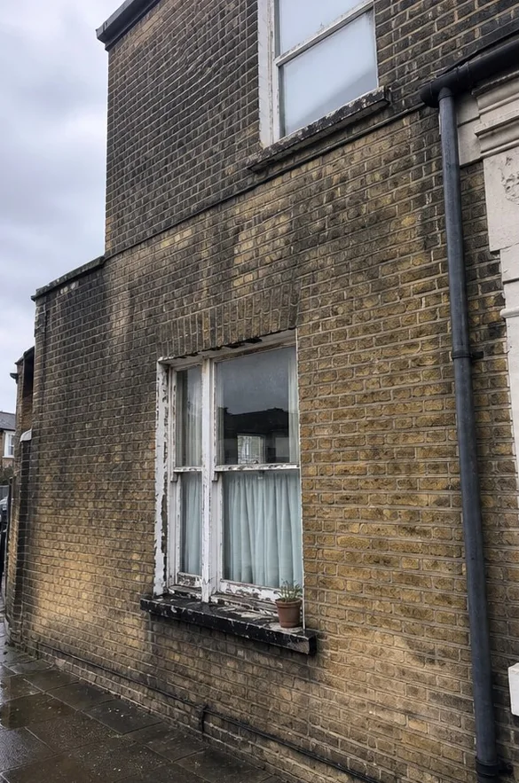 Brick front cleaned and repointed, before