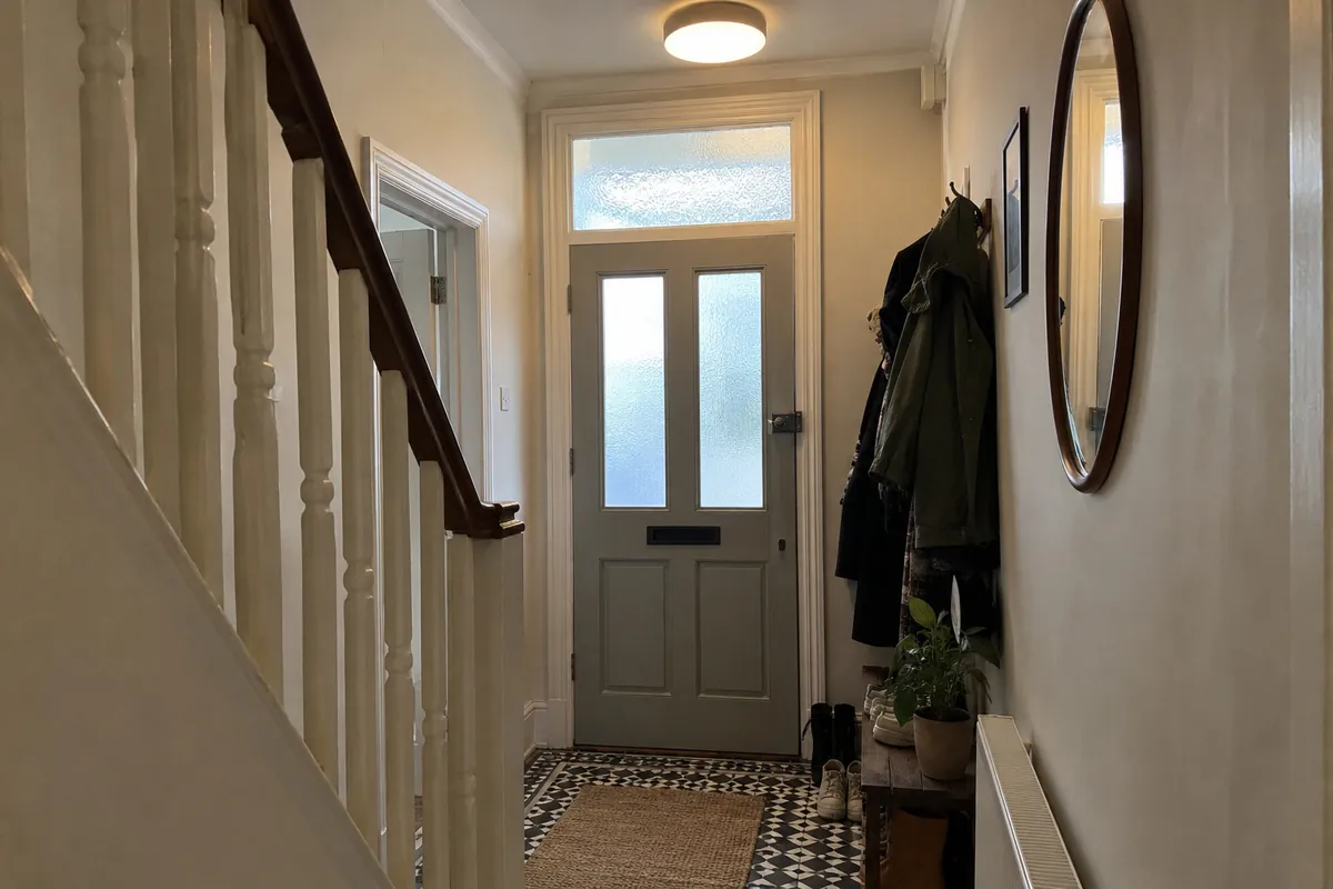 A hall and stairs made good and painted for the next tenant